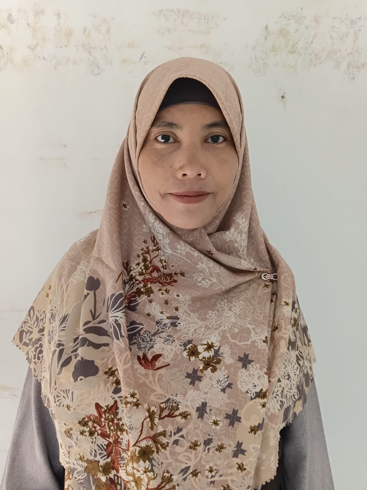 EUIS KOMARIAH