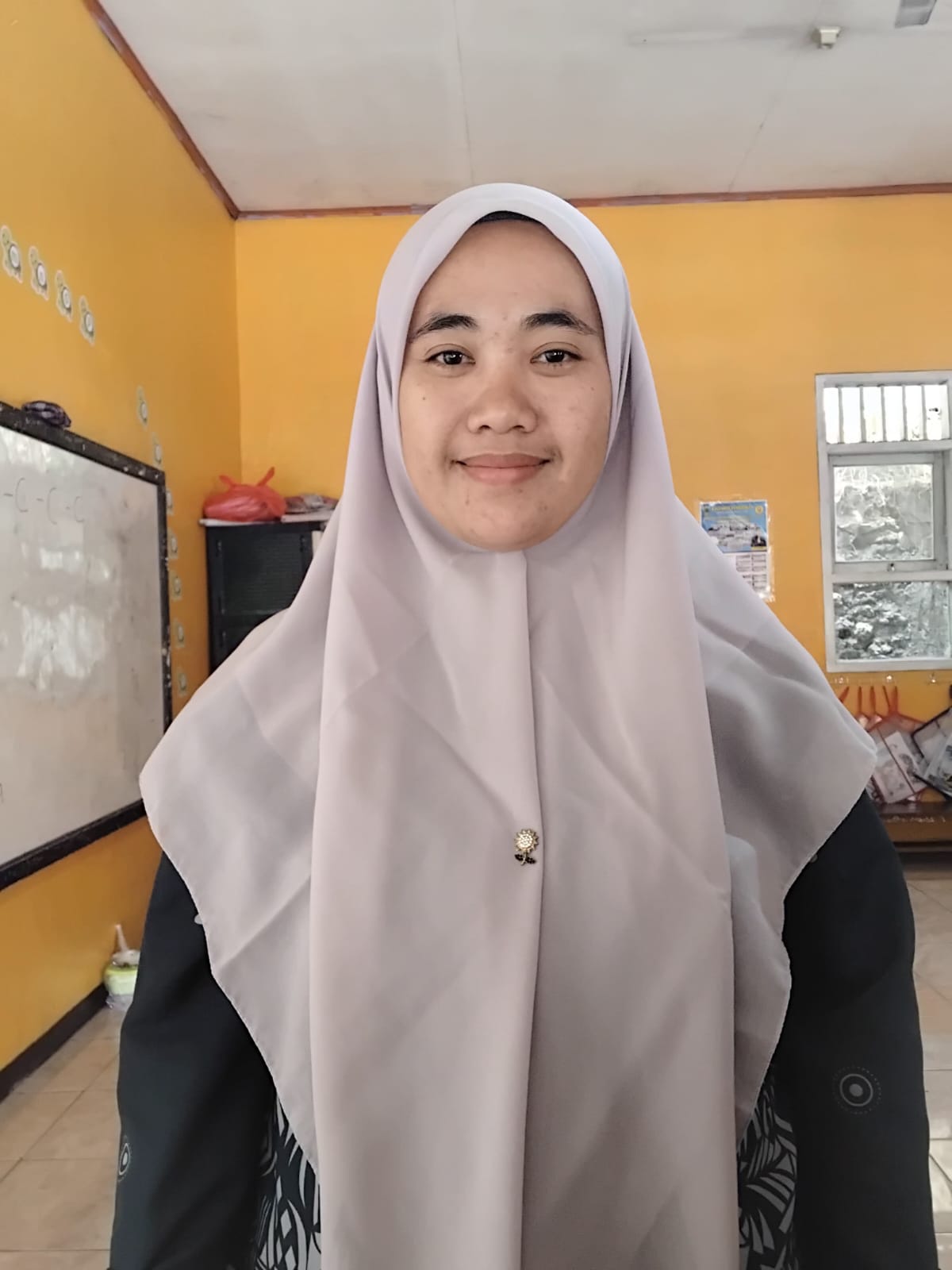 ATIN APRIANI